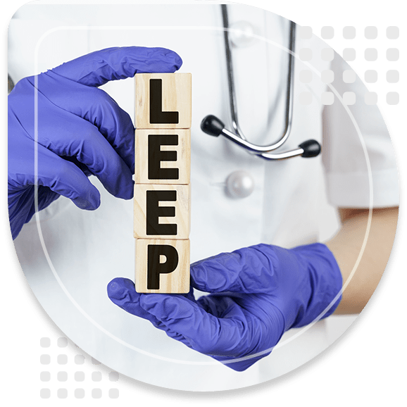 Medicine and health concept. The doctor holds cubes in his hands on which it is written - LEEP