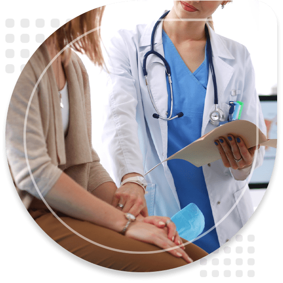 Doctor and patient discussing something while sitting at the table . Medicine and health care concept. Doctor and patient