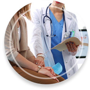 Doctor and patient discussing something while sitting at the table