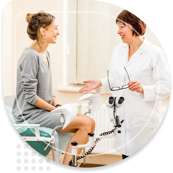Young woman patient with a senior gynecologist during the consultation in the gynecological office